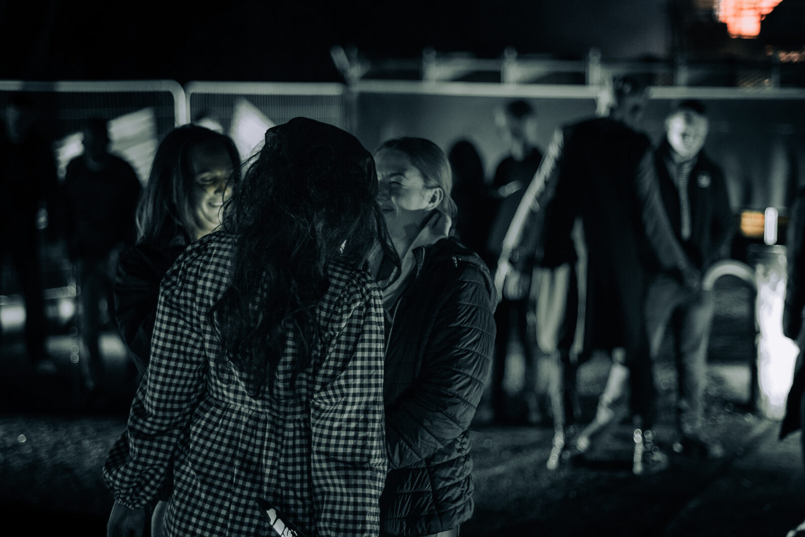 A group of guests reacting inside a scare attraction